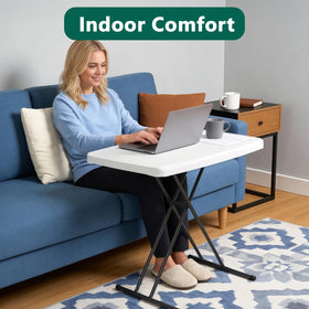 Make Changes folding table height-adjustment feature supports sofa-side laptop use or dining.