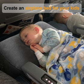 Maliton toddler foot rest in airplane creates a cozy bed space