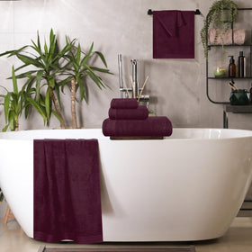 MALLONI HOME cotton texture close-up, 100% natural softness and durability.
