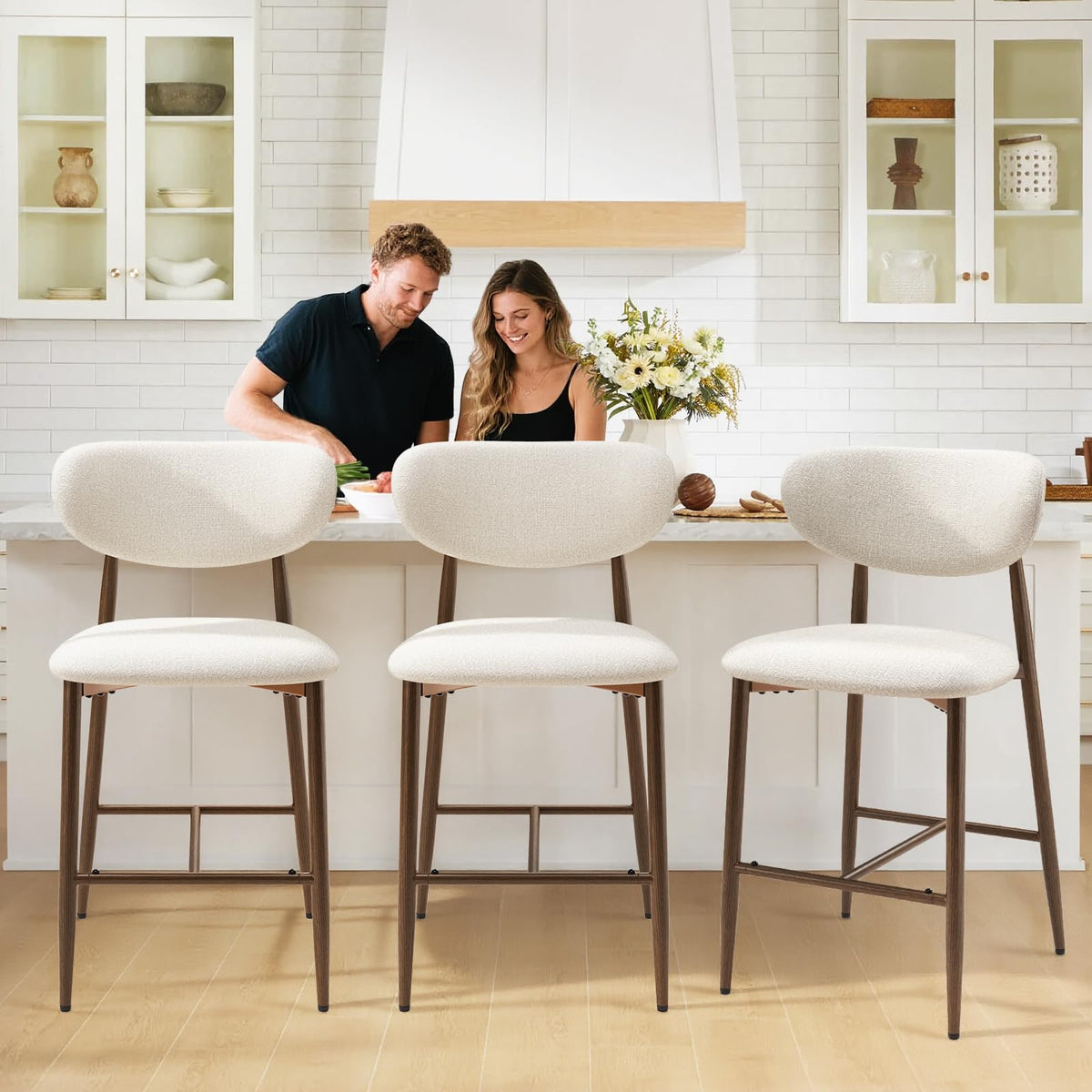 MALOL stools feature integrated footrests for stable, comfortable seating.