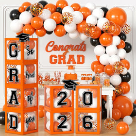 Mamfeov graduation arch kit boxes with orange decor for a festive entrance.