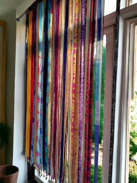 Mango Gifts recycled sari fabric curtain embraces eco-friendly style.