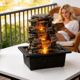 MAOCHI tabletop fountain showcases natural river rocks for an authentic, nature-inspired display.