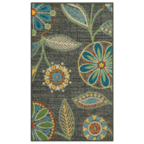 Maples Rugs Reggie floral pattern on dark grey rug enhances entryways.