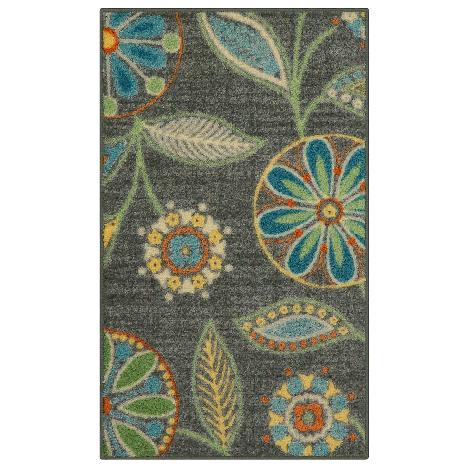 Maples Rugs Reggie floral pattern on dark grey rug enhances entryways.