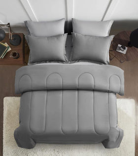 Maplestone fitted sheet on queen bed showing a secure 14-inch pocket