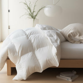 MapleStone twin-feather-down comforter closeup highlighting plush fill for cozy warmth.