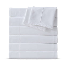Maple&Stone twin flat sheet with hemmed edge for a clean look.