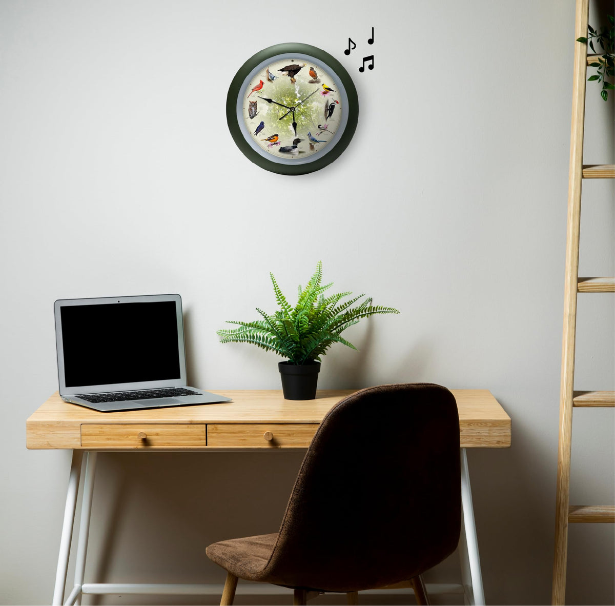 Mark Feldstein singing bird clock matte green finish close-up highlights refined craftsmanship.