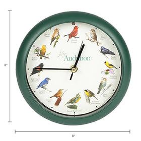 Close-up of green dial and wooden texture on the Audubon clock.