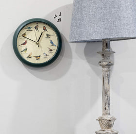 Mark Feldstein clock close-up reveals rich green finish enhancing room decor