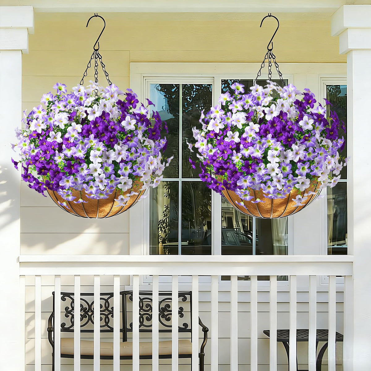MARTINE MALL colorful faux flowers in planters brighten entryways.