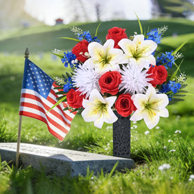 MARTINE MALL flowers beside the headstone create a serene memorial presence.