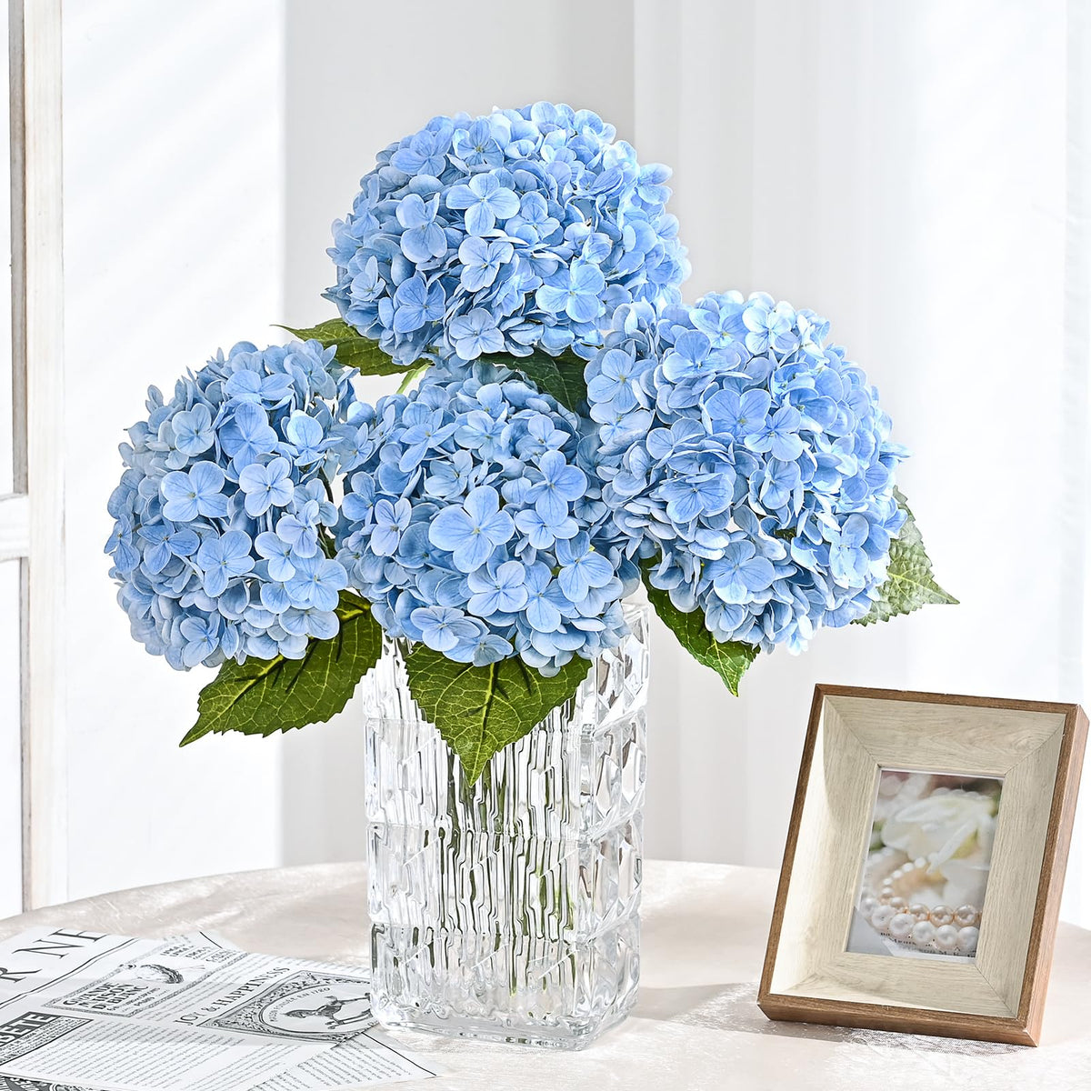 Martine Mall hydrangea leaves detail adds natural fullness.