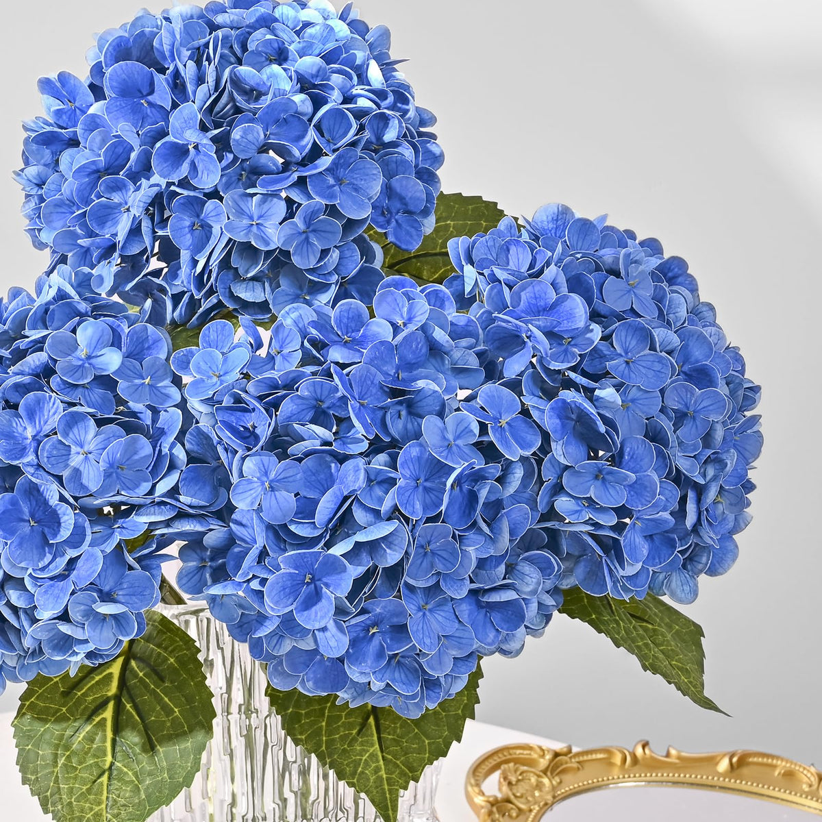 Office decor accent using Martine Mall dark blue hydrangea.