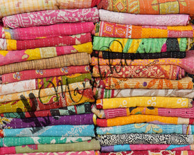 Marubhumi Kantha cotton bundle of 10 quilts delivers durable, versatile decor.