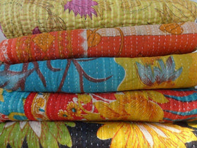Marubhumi handmade Kantha stitch detail enhances cozy throw in any space
