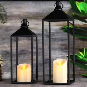 MATAHUM large black lantern sits on a mantle, warm glow enhancing the room ambience