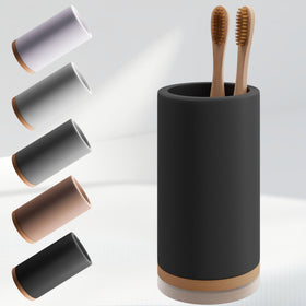 Matani bamboo toothbrush holder on a counter, keeping brushes organized and dry.