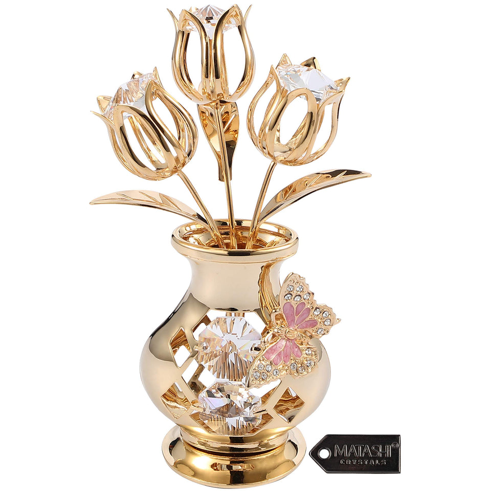 Matashi 24K gold plated crystal flower with butterfly shines as mantel centerpiece.