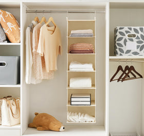 MAX Houser yellow two-pack closet organizers save vertical space on a rod.