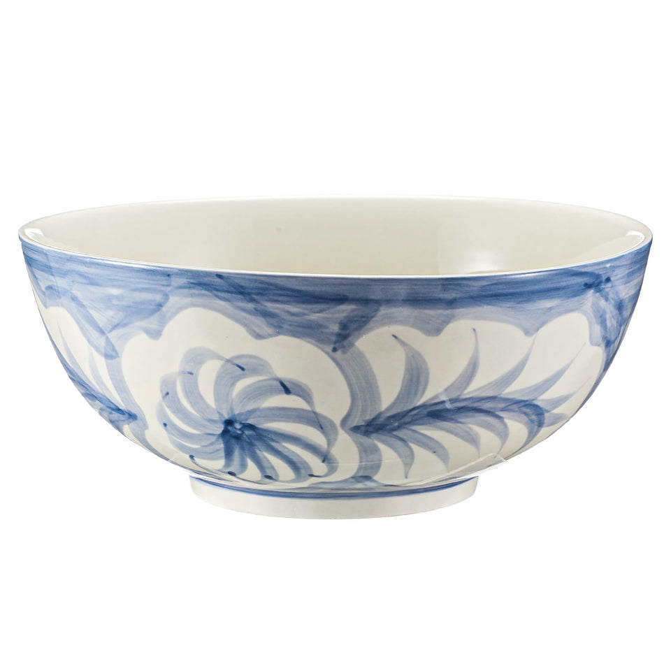Maxdot blue and white hand-painted bowl serves as an elegant centerpiece for meals.