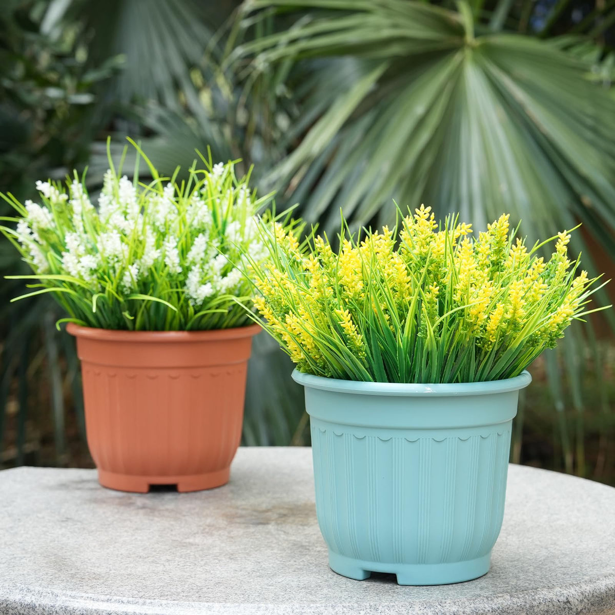 Maxkes window box lavender faux plants elevating curb appeal.