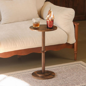 MaxSmeo side table with fluted wood legs adds mid century charm to rooms