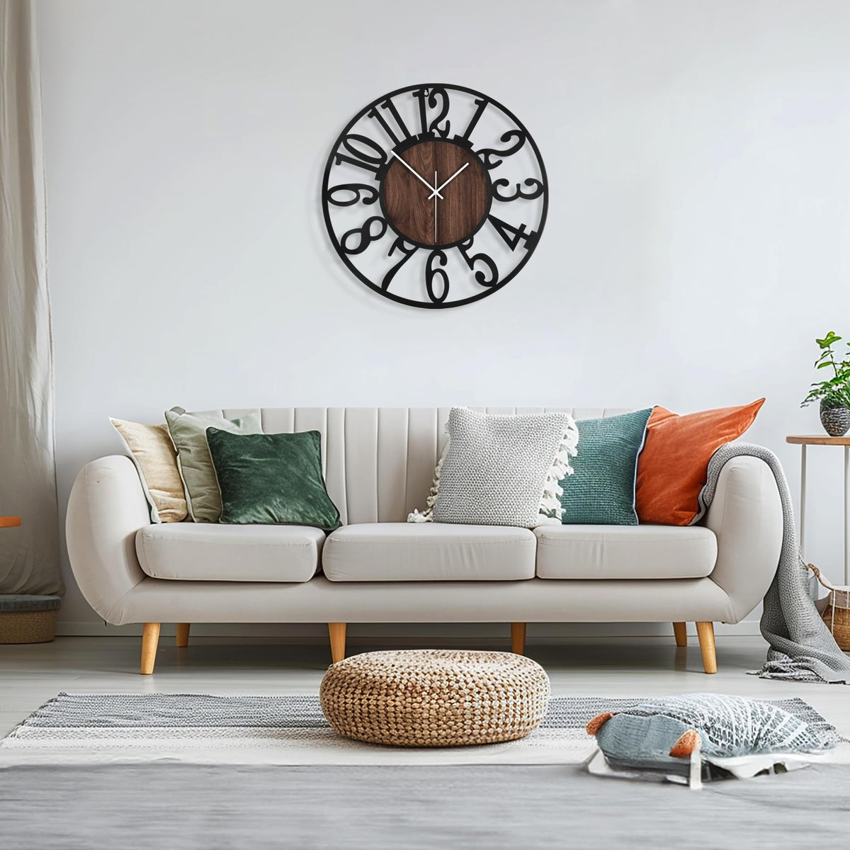 Maxstar round wall clock with included hooks for easy hanging.