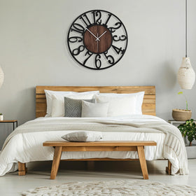 Maxstar round clock enhances living room decor and overall room aesthetics.