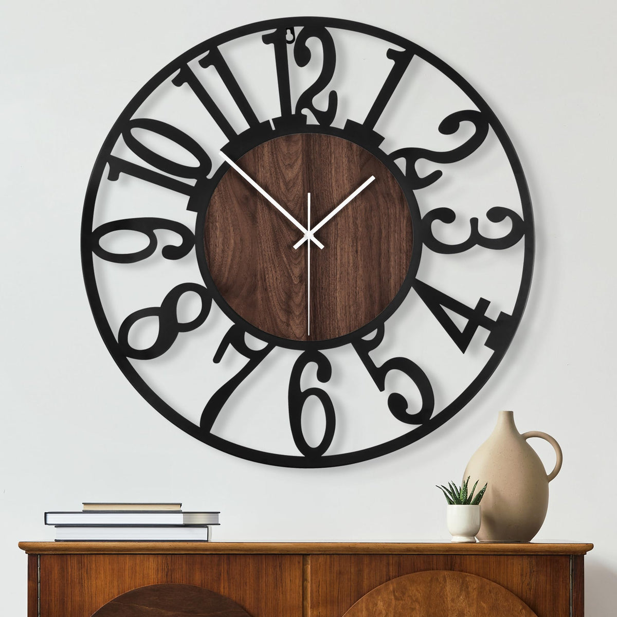Maxstar round wall clock with wood veneer finish for a warm living room ambiance.