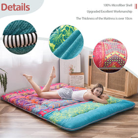 MAXYOYO Car-ready mattress rolled for travel convenience.