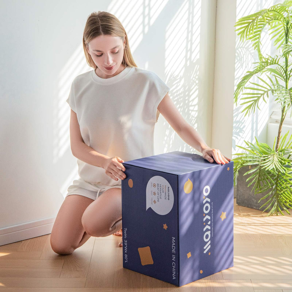 MAXYOYO foldable mattress shown ready for easy transport
