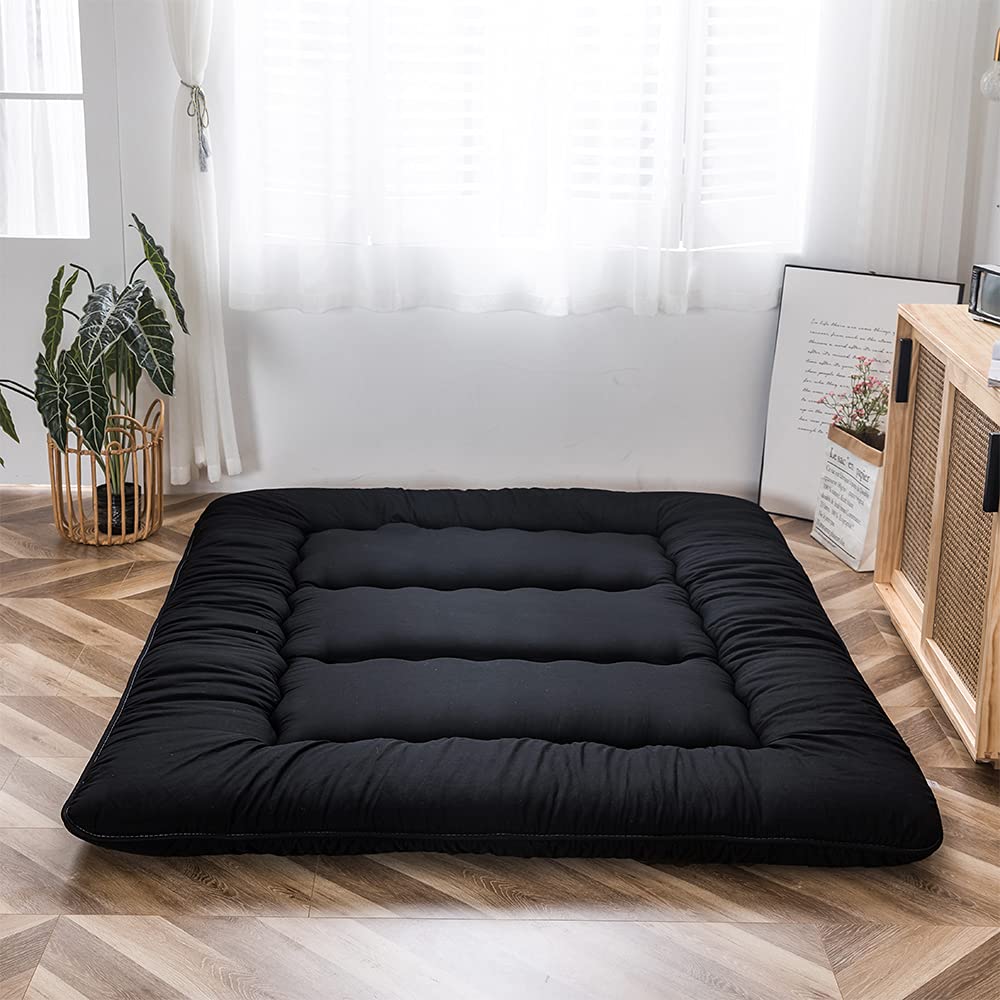 Dorm room scene with MAXYOYO mattress used as lounging and sleeping surface.