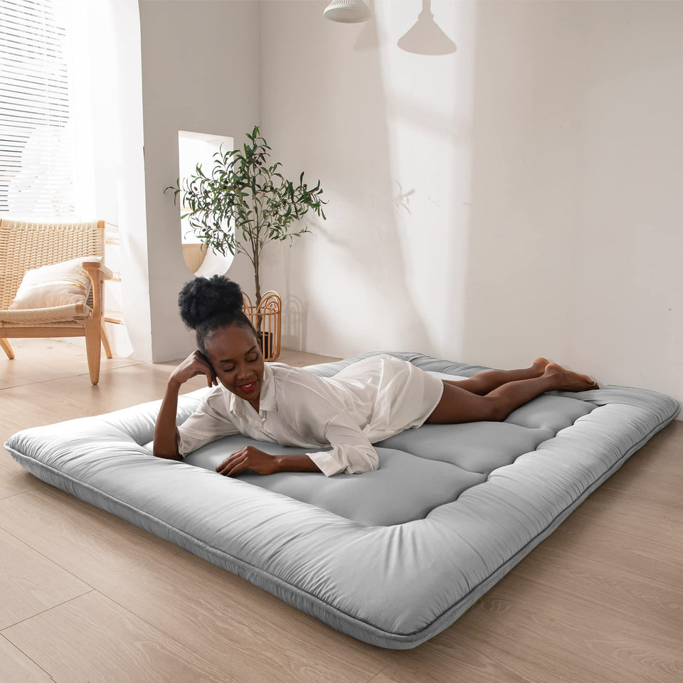 MAXYOYO Japanese floor mattress folded view shows compact storage and easy transport.