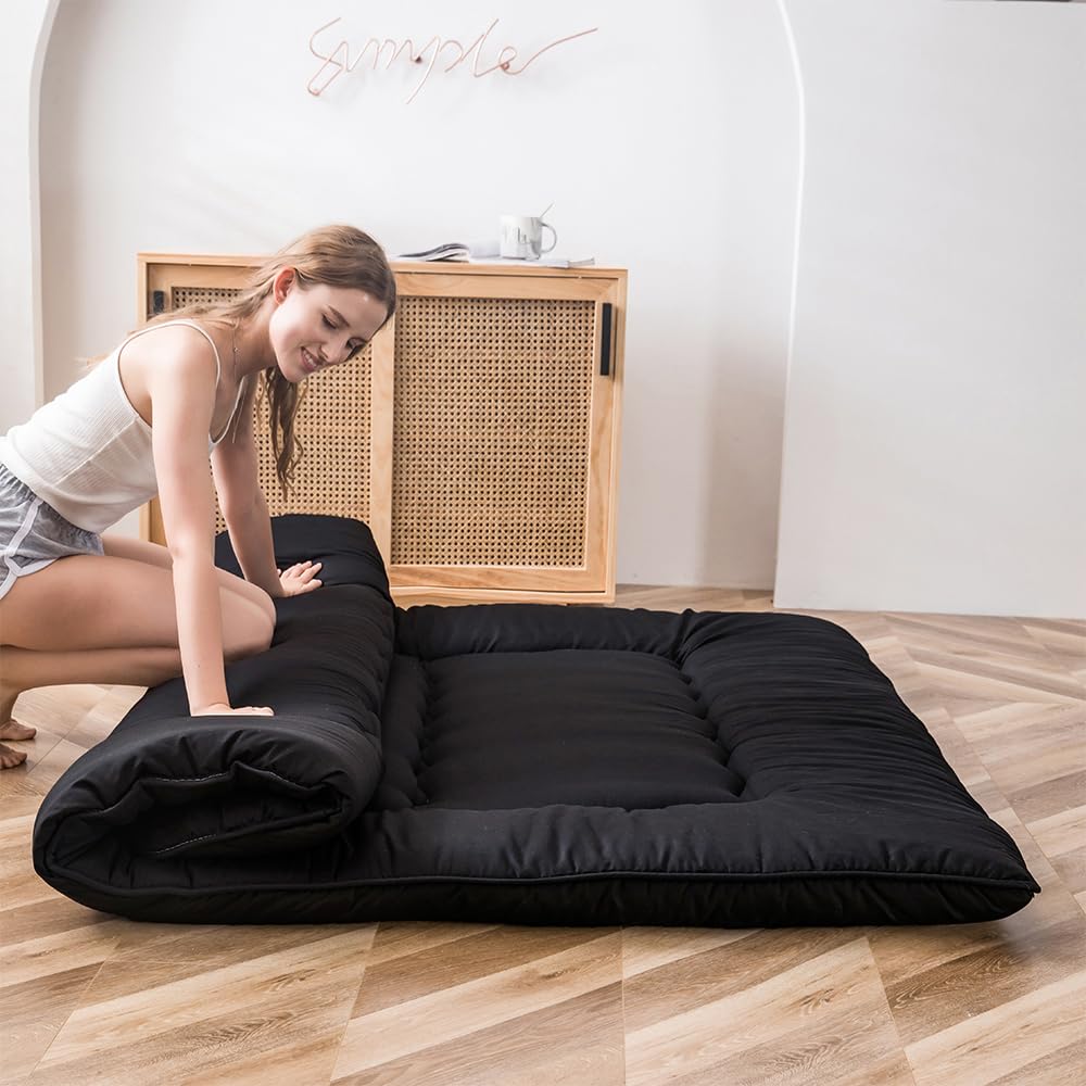 Full-size MAXYOYO floor mattress shown from the front in a cozy setup.