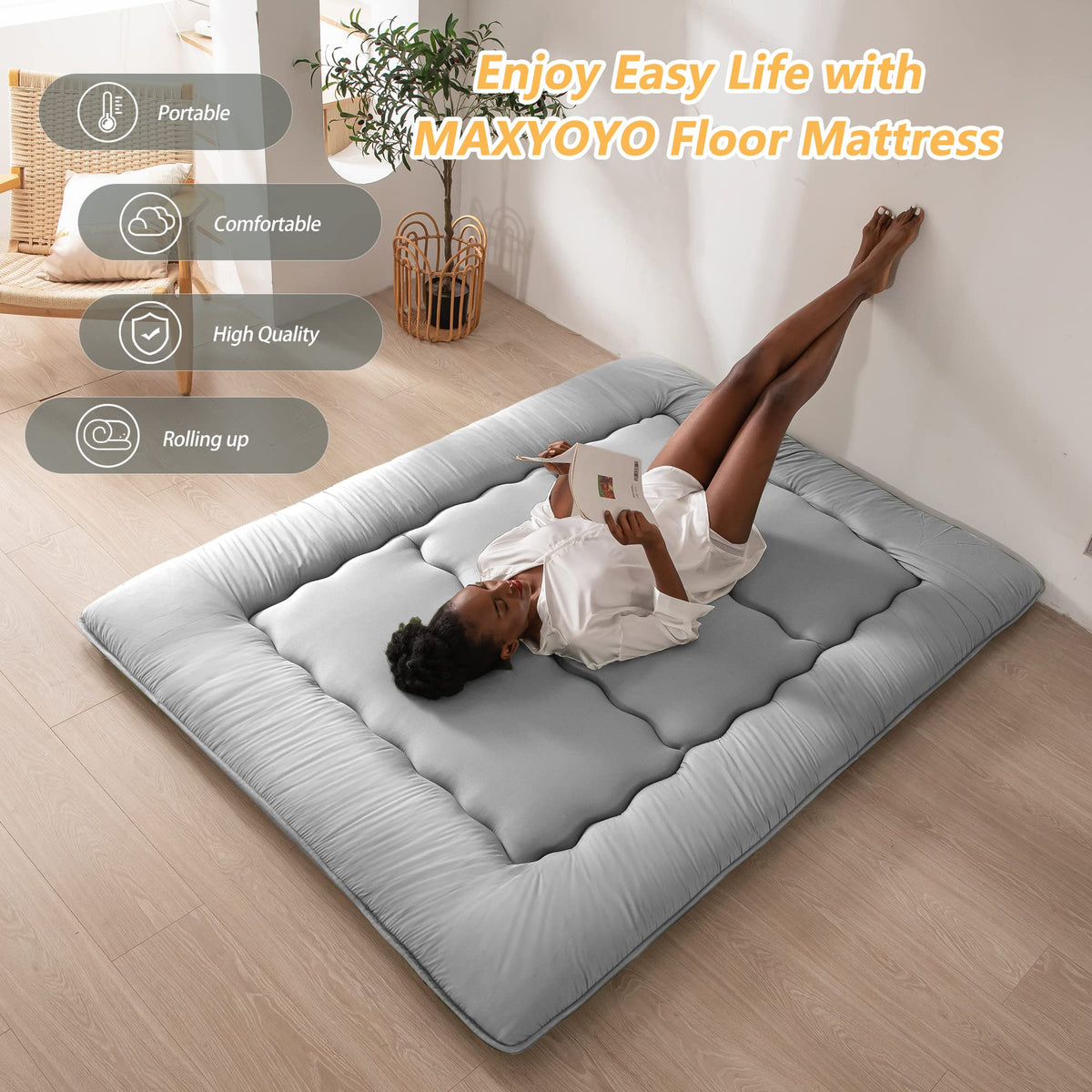 MAXYOYO tatami-style surface in living area highlights versatile seating and sleeping.