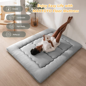 MAXYOYO tatami-style surface in living area highlights versatile seating and sleeping.