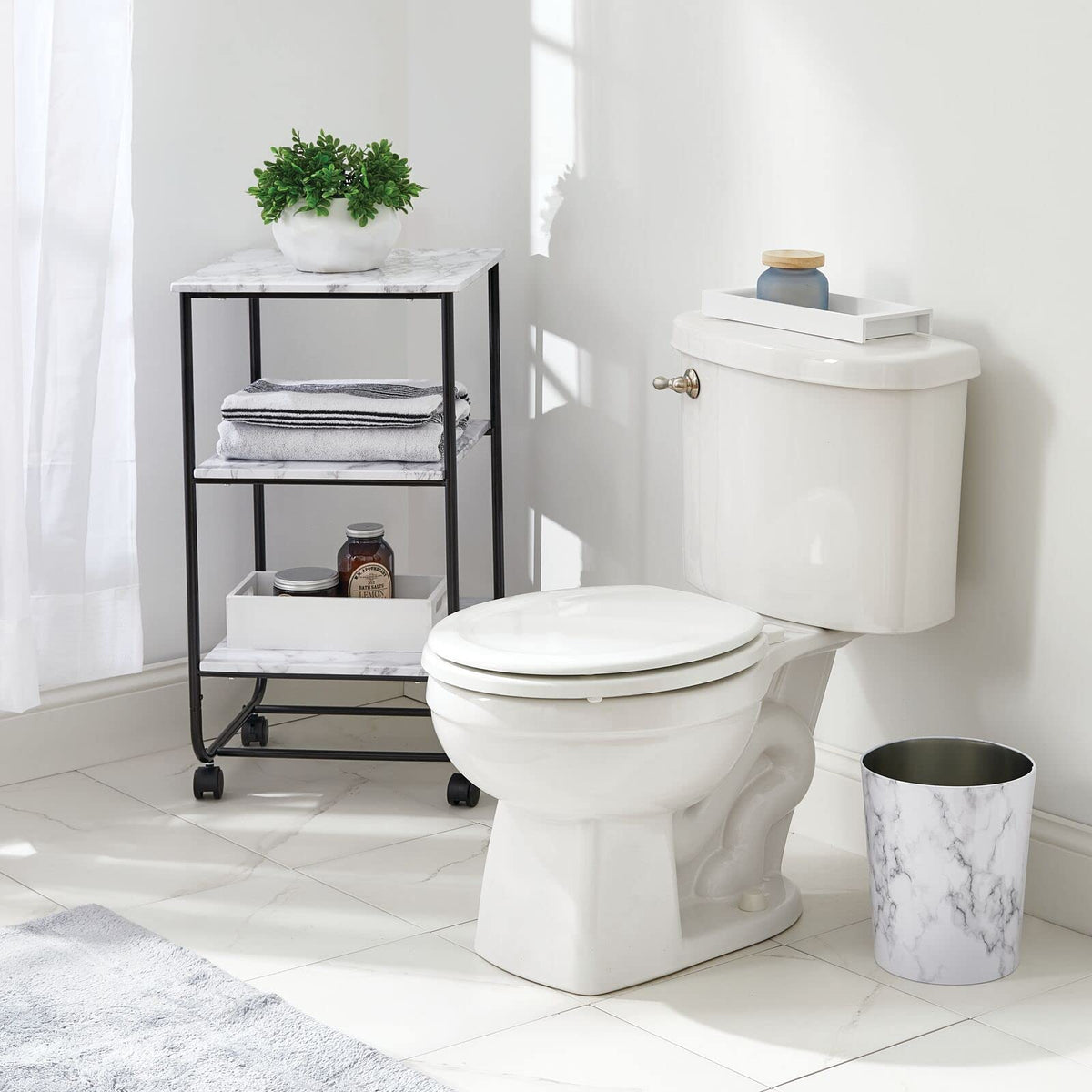 MDesign Mirri white marble trim detail on trash can adds stylish, easy-to-clean appeal.