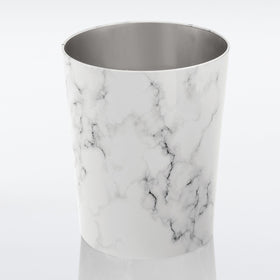 MDesign sleek compact wastebasket keeps rooms tidy and clutter-free.