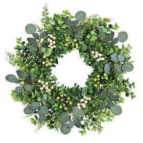 MDSTBN 26-inch eucalyptus wreath on front door adds seasonal curb appeal.