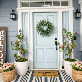 MDSTBN ready-to-hang wreath; fluff leaves for immediate display.