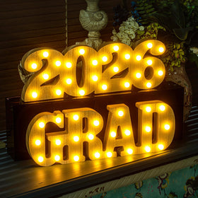 MEADIN Grad 2026 wooden sign with warm LED illumination