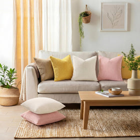Cream white Mecatny pillow cover with corduroy texture elevates living room decor.