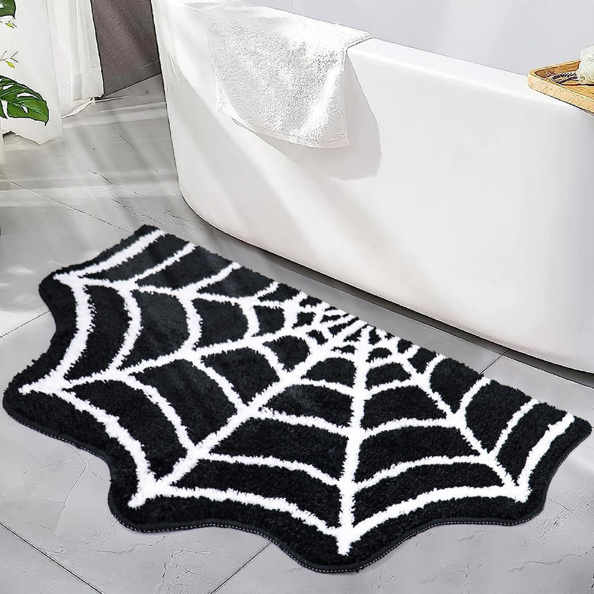 Meetory Spider Web Bath Mat in black offers plush comfort and absorbency.