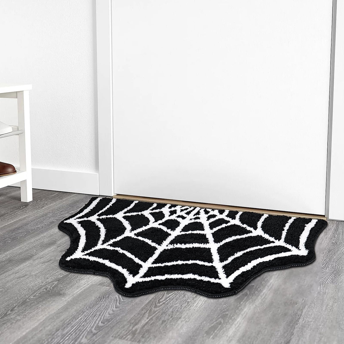 Meetory spider web kitchen rug combines spooky decor with practicality.