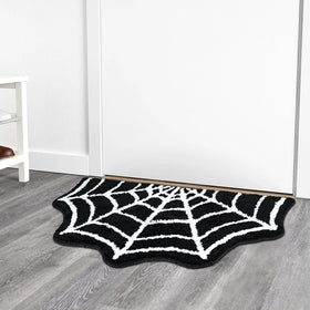Meetory spider web kitchen rug combines spooky decor with practicality.