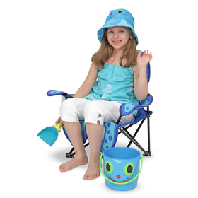 Melissa & Doug chair folding into its matching cinch pouch