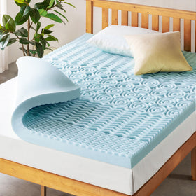 Mellow 4-inch 5-zone topper on bed offers undisturbed sleep.