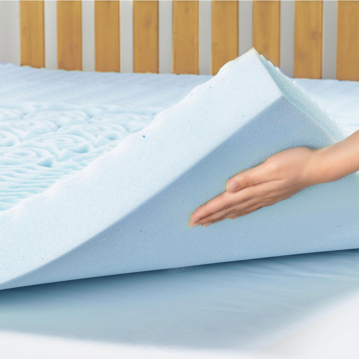 Mellow dorm essentials topper on a mattress ready for setup.